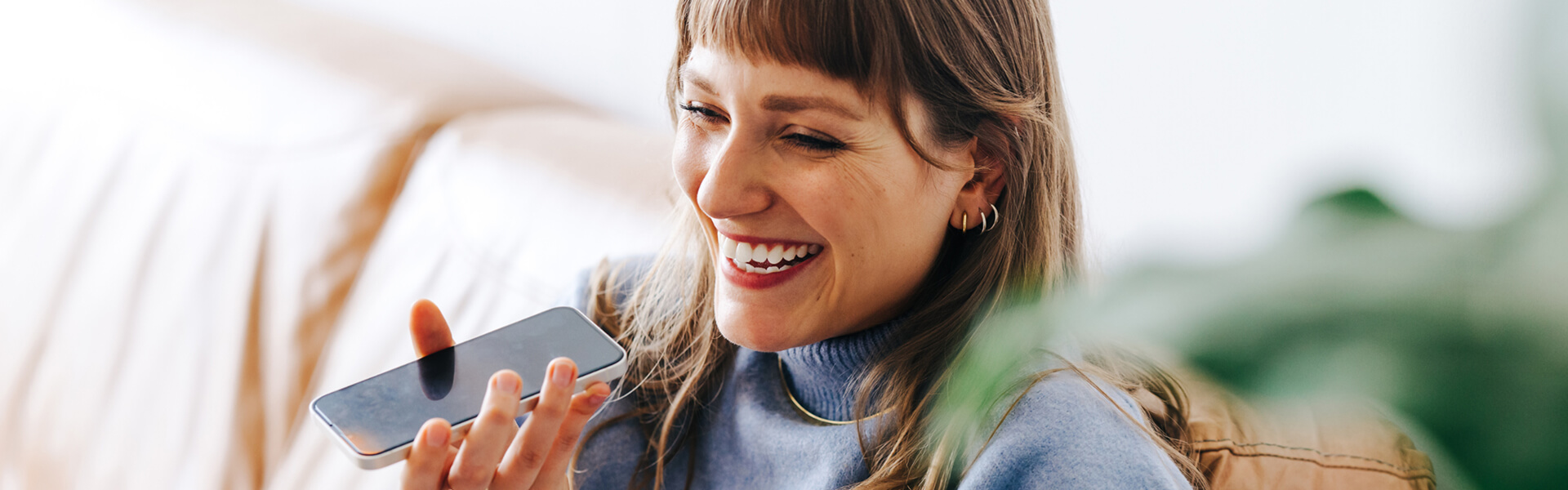 Person holding a phone to contact