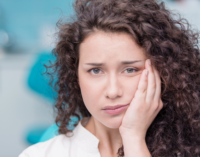 woman with jaw pain