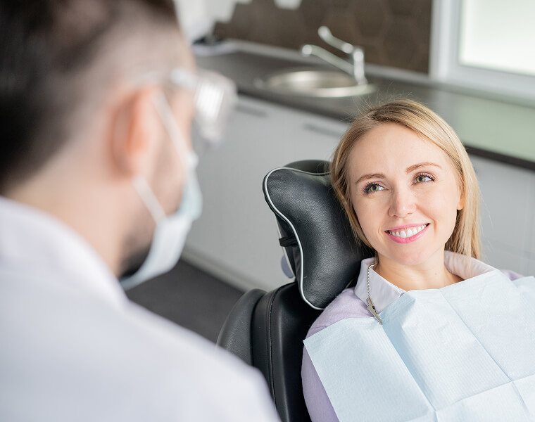 smiling woman at the dentist